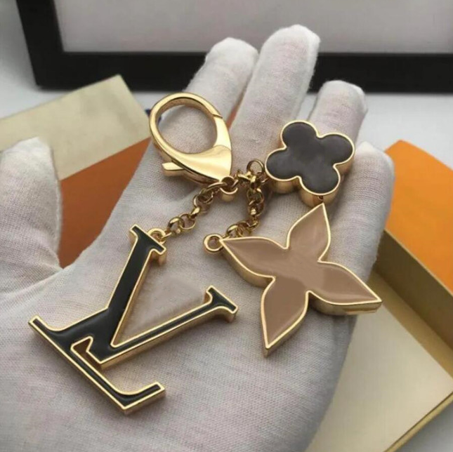 Elegant Charming FlWERower-Shaped Metal Key Chain Designer keychain Chic French Style Bag Charm Auto Accessory perfect Christmas gift for Her - 1 of 5